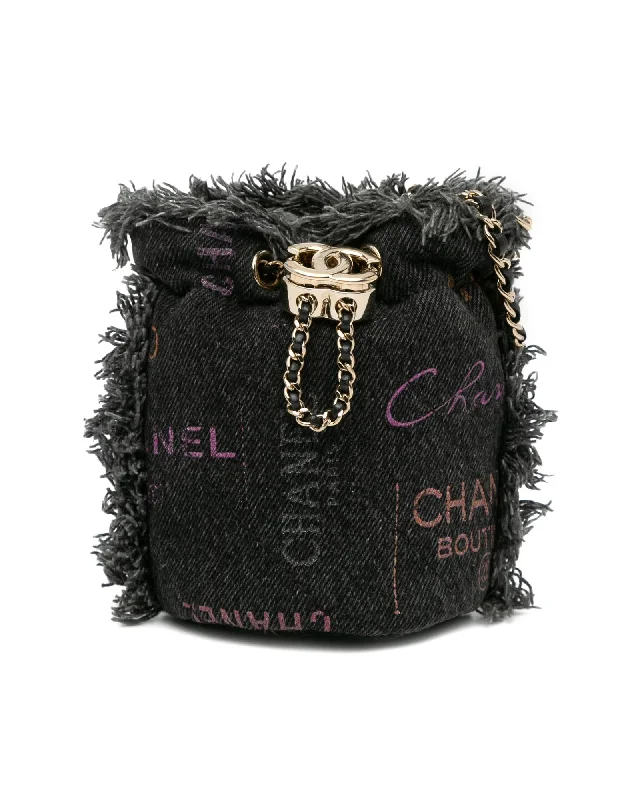 Studded bucket bag with a punk - rock vibeMini Quilted Denim Bucket Bag with Chain Strap and Drawstring Closure