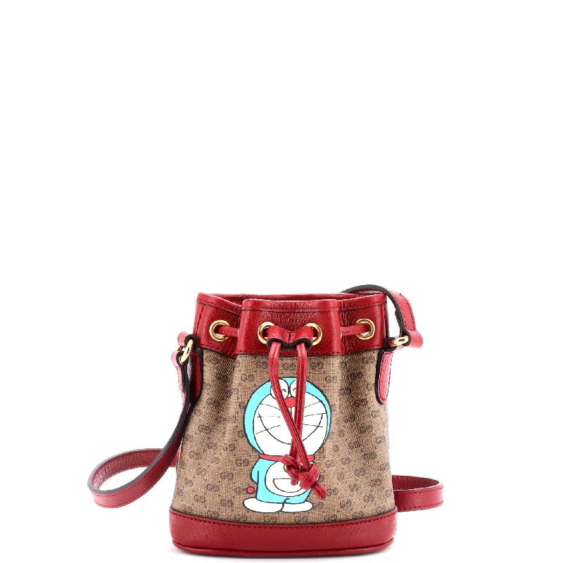 Leatherette bucket bag with a quilted texture for a sophisticated appearanceDoraemon Bucket Bag Printed Mini GG Coated Canvas Mini