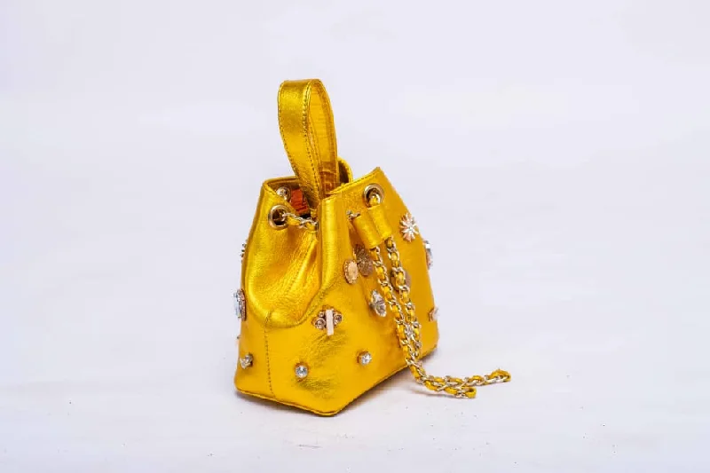 Convertible bucket bag that can be worn as a cross - body or shoulder bagDOT Embellished Yellow Leather Bucket Bag