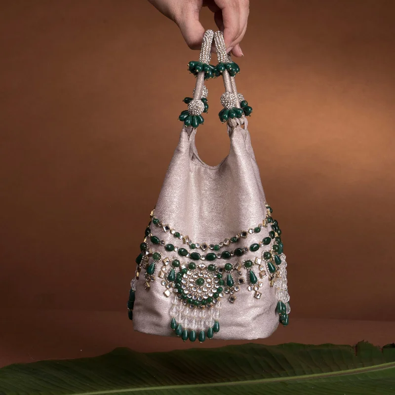 Women's leather bucket bag with a hand - painted floral design for a unique touchPanna Emerald Kundan bucket bag