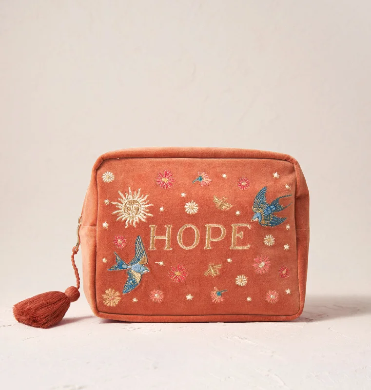 Convertible makeup bag that can be hung on a hook or laid flatGive Hope Wash Bag