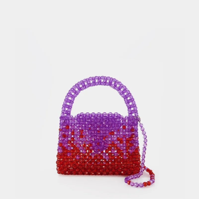 Vintage - inspired hobo bag with a brass frame and tassel detailsSs23Bg01 Hobo Bag - Germanier - Purple/Red - Pearl