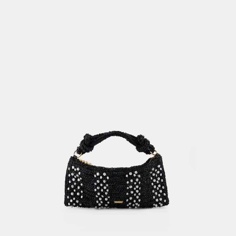 Quilted hobo bag with a diamond pattern for a classic aestheticHera Nano Shoulder Bag - Cult Gaia - Raffia - Black