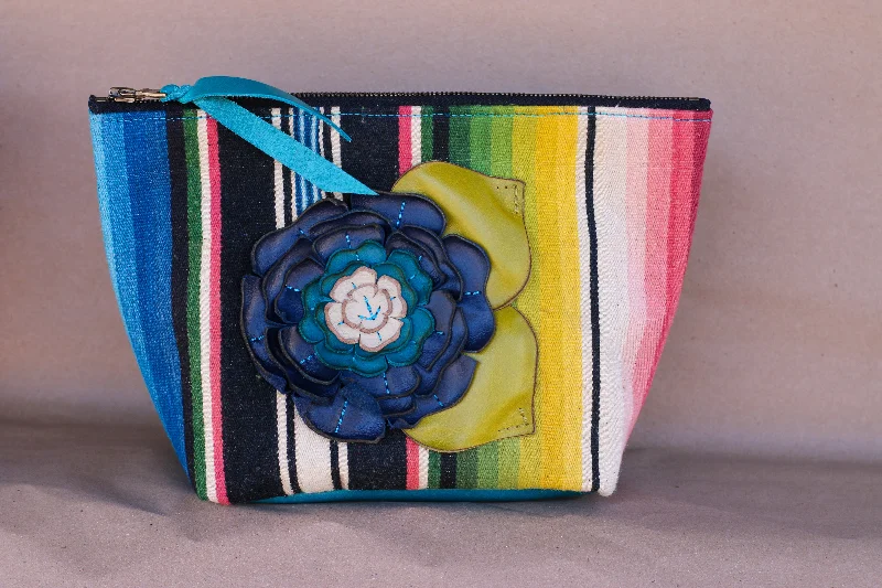 Soft velvet makeup bag in a rich purple color for a touch of luxurySerape Makeup Bag