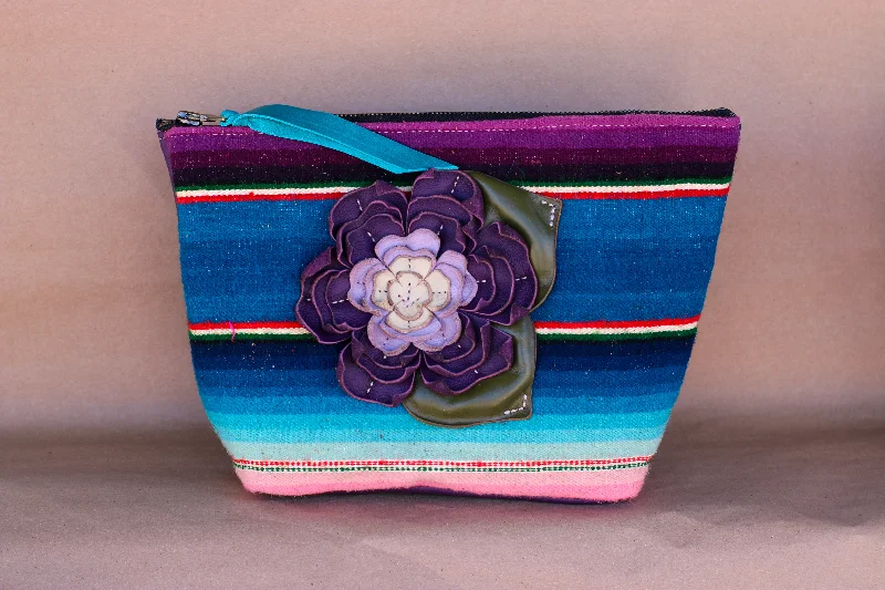 Makeup bag with a large mirror and elasticized pockets for organizationSerape Makeup Bag