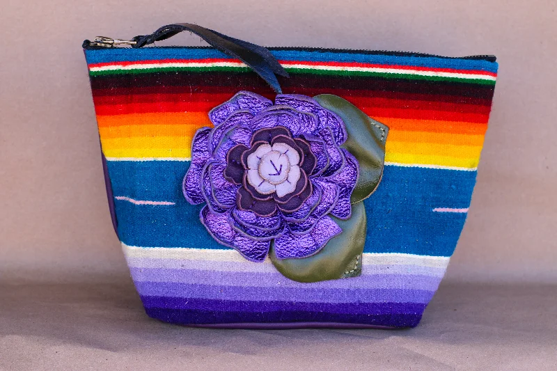 Metallic makeup bag with a shiny finish for evening useSerape Makeup Bag