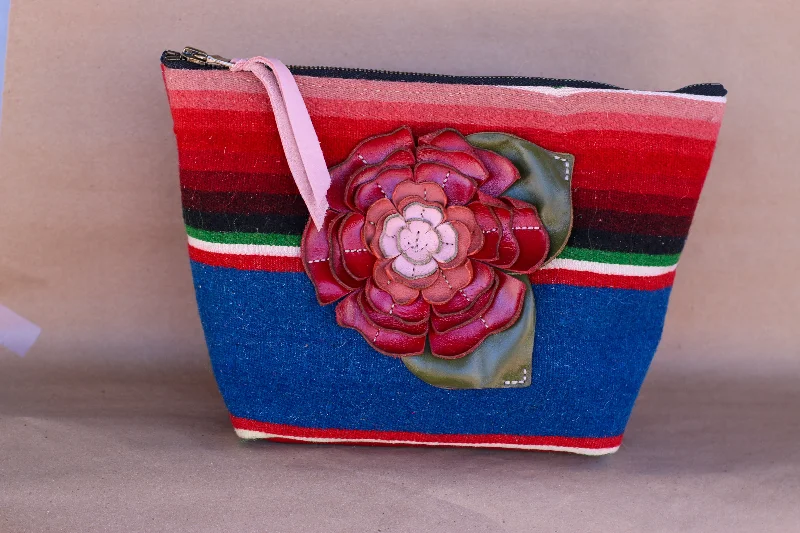 Makeup bag with a large mirror and elasticized pockets for organizationSerape Makeup Bag