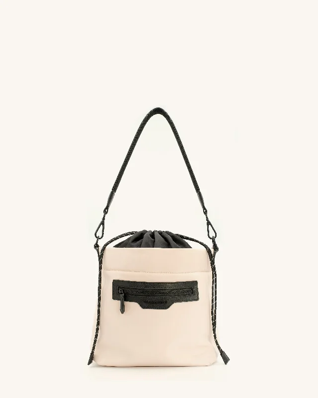 Suede bucket bag in a pastel color for a soft and feminine aestheticSmall Swing Bag - Coconut