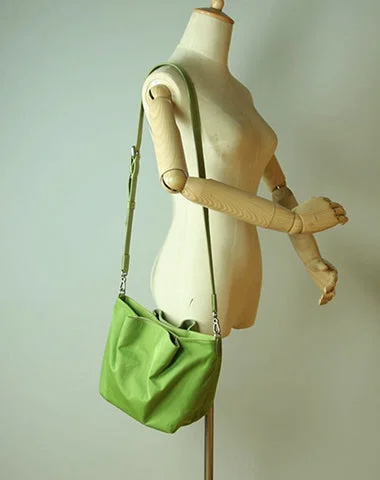 Bucket bag with a tassel or fringe detail for a bohemian feelSmall Womens Green Nylon Leather Crossbody Handbag Purse Bucket Green Nylon Shoulder Bag Purse for Ladies