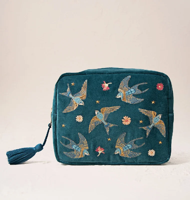 Women's leather makeup bag with a hand-stitched border and gold zippersSwallows Wash Bag