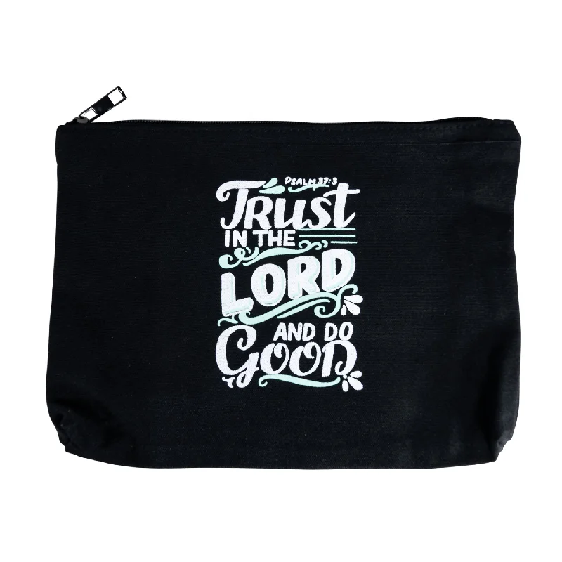 Vintage-inspired leather makeup bag with a brass clasp and tasselTrust in the Lord Canvas Bag (black)