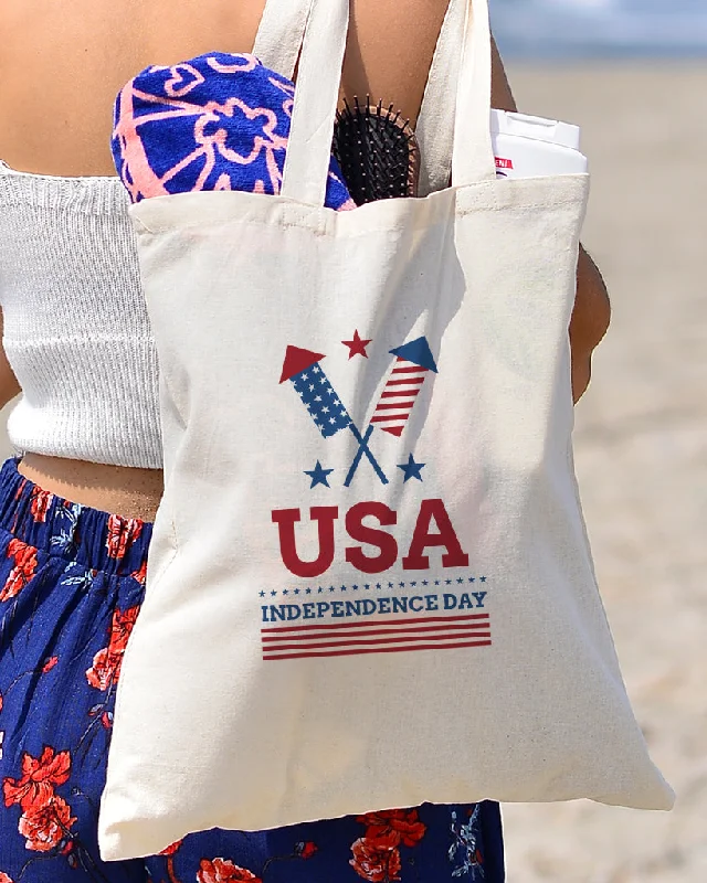 Tote bag with multiple internal compartments and a zippered pocket for organizationLet's Celebrate Tote Bag - 4th Of July Tote Bags