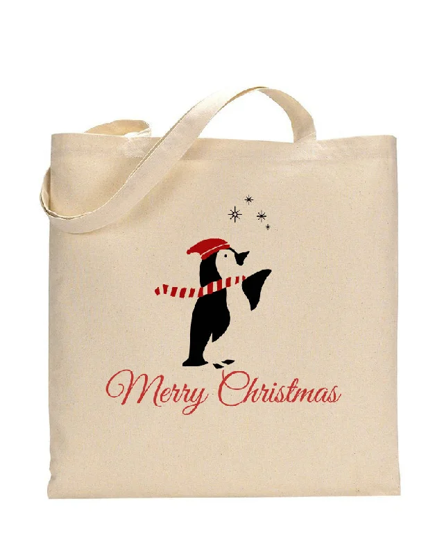 Convertible tote bag that can be worn as a shoulder or cross-body bagPenguin and Stars Merry Christmas Tote Bag - Christmas Bags