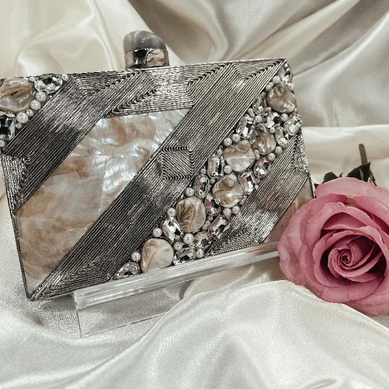 Lace - covered clutch for a romantic and feminine lookANILA Clutch (Silver)