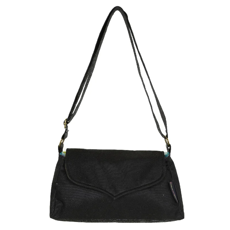 Plus - size crossbody bag with a roomy interior for carrying essentialsAnnie: Black Waxed Canvas