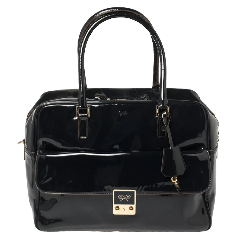 Waterproof nylon satchel with a drawstring closure for outdoor useAnya Hindmarch  Patent Leather Carker Satchel