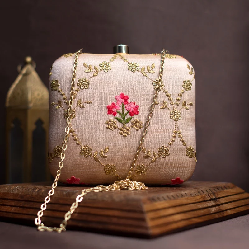 Metallic leather evening bag with a textured finishArtklim Baby Pink Embroidery Party Clutch