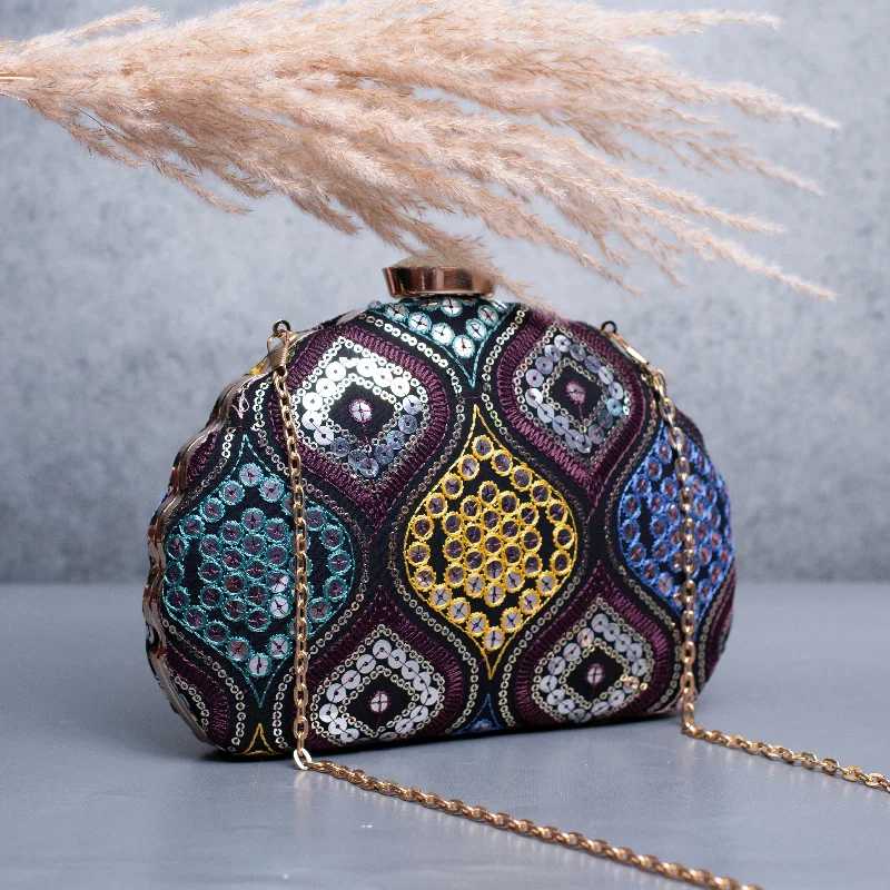 Mother - of - pearl clutch with a delicate sheenArtklim Black Based Silver Sequins Multicolored Threadwork Embroidery Clutch