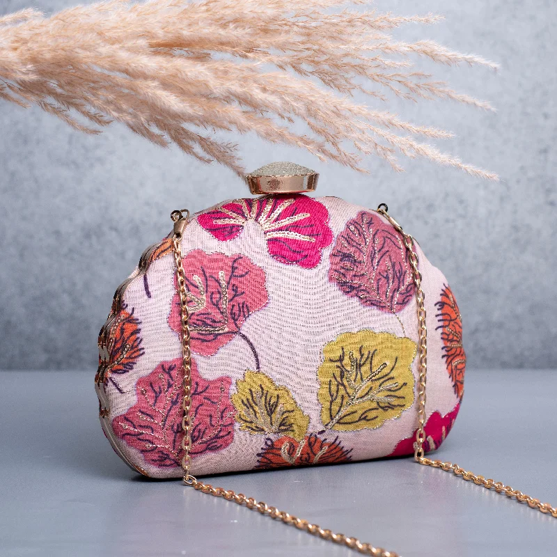 Velvet clutch with a tassel detail for a bohemian - chic styleArtklim Light Pink Based Floral Golden Zari Embroidery Clutch