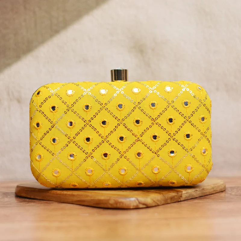 Embroidered silk clutch with a traditional motif for a cultural touchArtklim Yellow Sequins Party Clutch