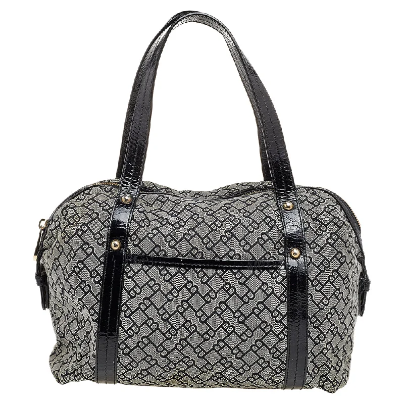 Convertible satchel that can be worn as a crossbody or shoulder bagBally  Patent Leather And Canvas Satchel