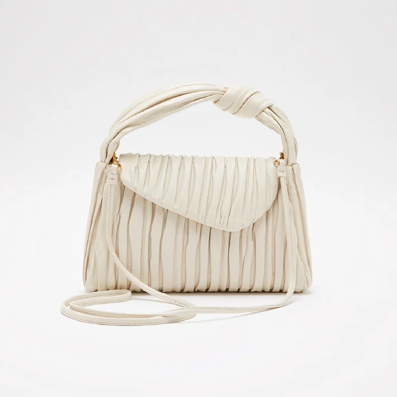 Color - blocked handle bag with a combination of bright and neutral colorsSoftissima Small Pleated Leather Bag - Milk