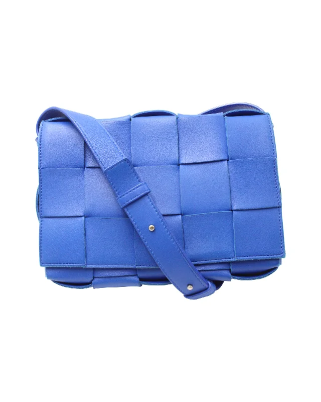 Laser-cut leather satchel with an intricate geometric designBottega Veneta Cassette Bag in Blue Lambskin Leather