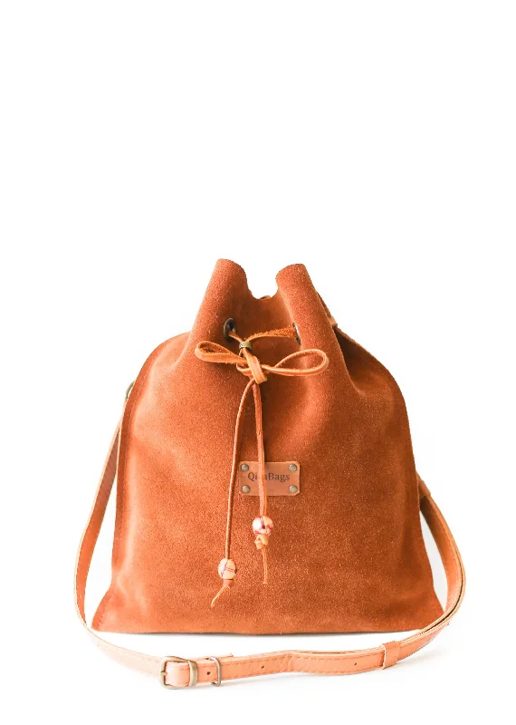 Mini crossbody bag with a chain strap for a trendy and compact lookBrown Suede Cross Body Bag