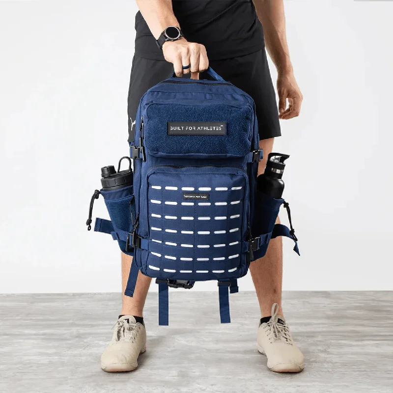 Laser - cut leather backpack with an intricate geometric designBuilt For Athletes Large Gym Backpack Navy/White