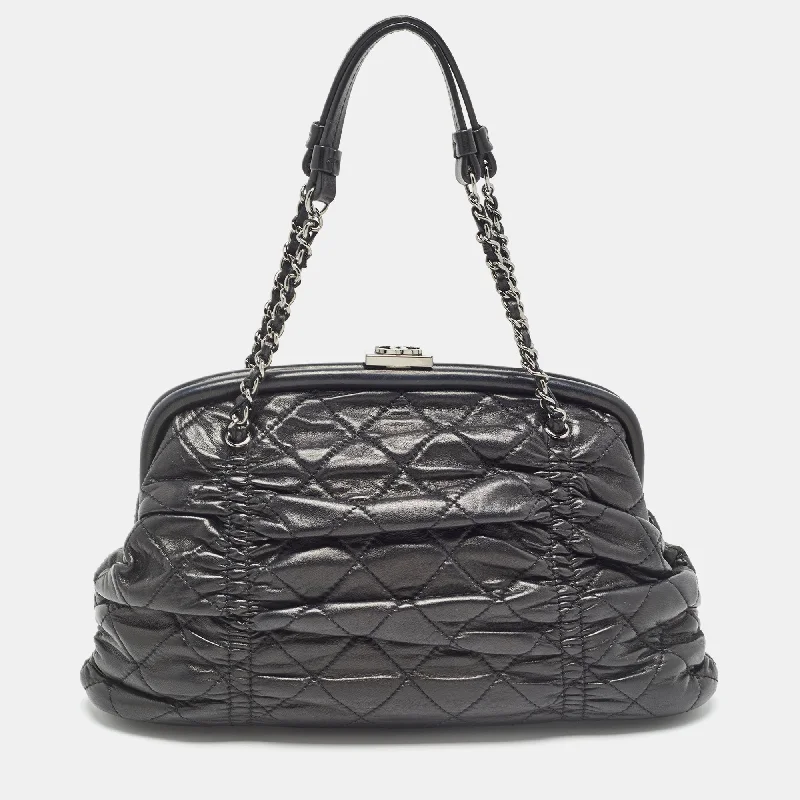 Vintage-inspired satchel with a brass buckle and leather tasselsChanel Black Quilted Leather Sharpei Frame Bag