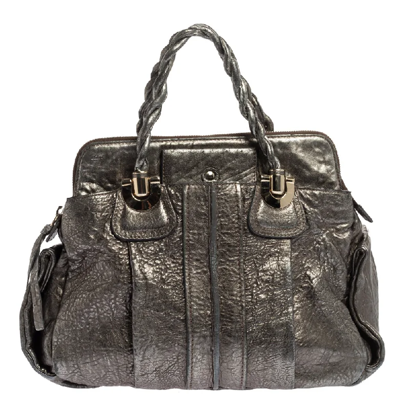 Faux fur satchel with a fluffy exterior for a winter fashion statementChloe  Textured Leather Heloise Satchel