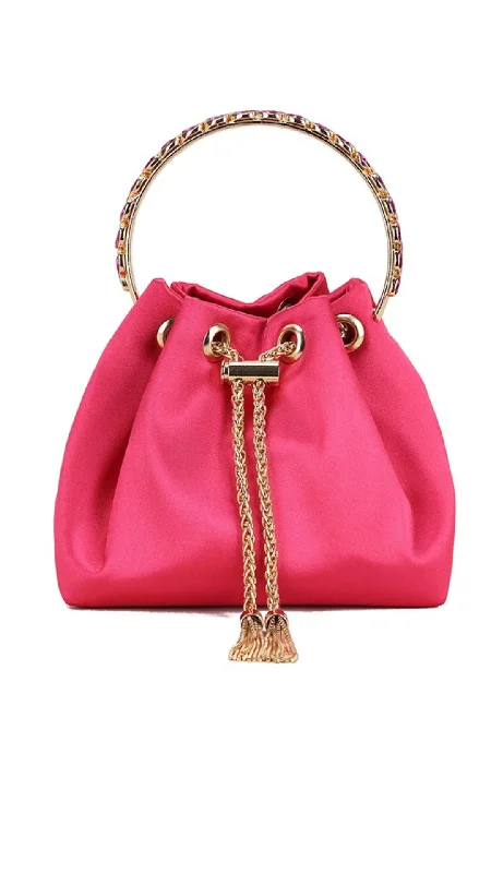 Miniature evening bag with a fold - over clasp for a compact optionDani Clutch- Fuchsia