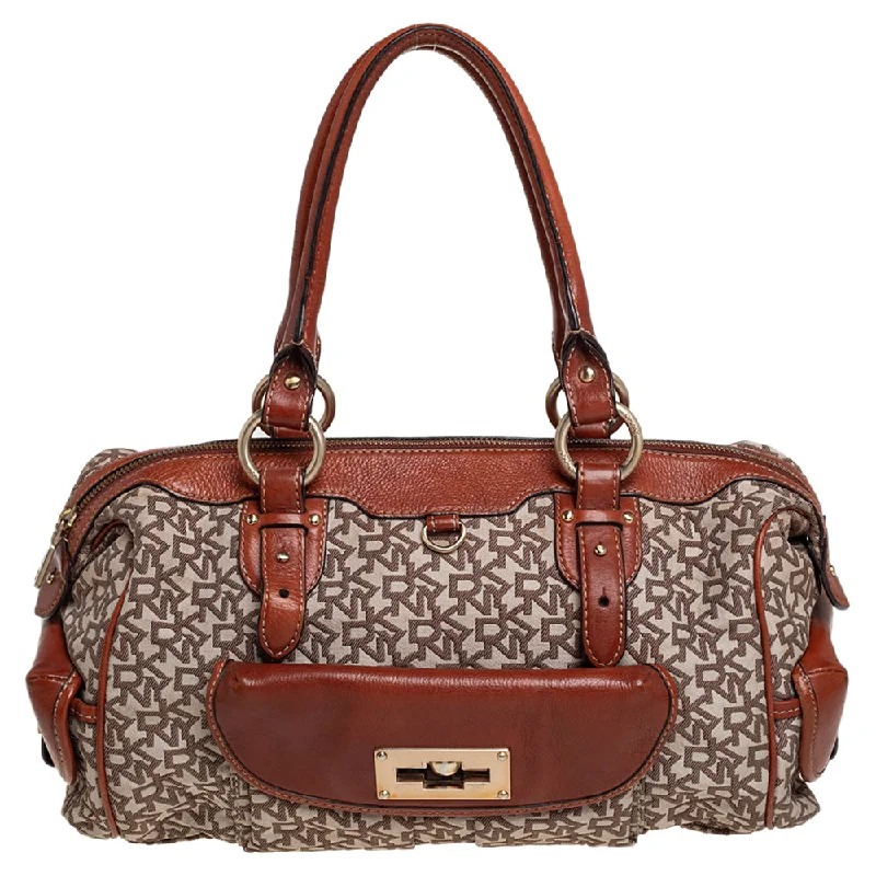 Faux fur satchel with a fluffy exterior for a winter fashion statementDkny /brown Signature Canvas And Leather Satchel