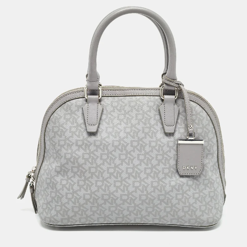 Plus-size satchel with a spacious interior for carrying all essentialsDkny Signature Coated Canvas And Leather Dome Satchel