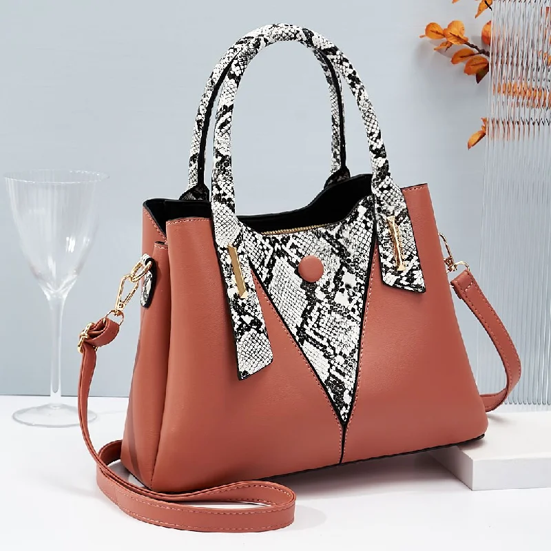 Women's studded leather shoulder bags with a punk - rock edgeFashionable snake-pattern spliced women hand bags good quality large volume factory shoulder cross body bag