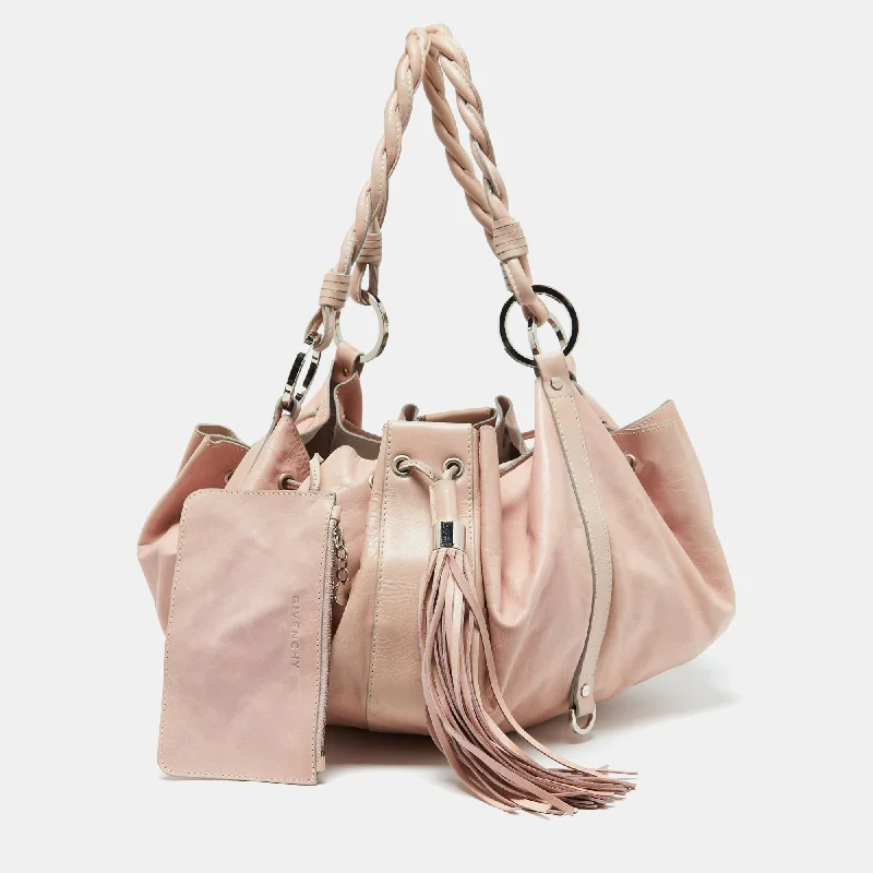 Satchel with a hidden anti-theft pocket for securityGivenchy Pink Leather Drawstring Tassel Hobo