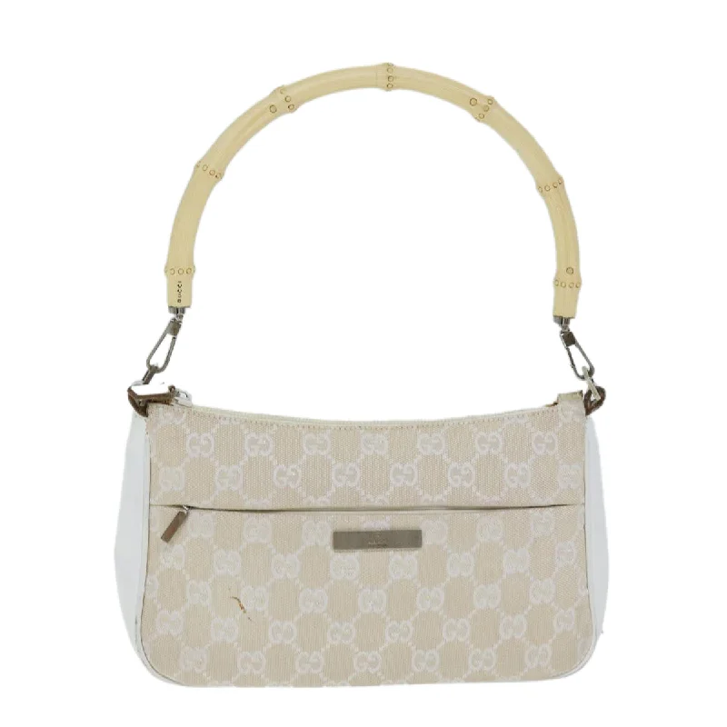 Floral - printed clutch for a spring or summer eveningGucci Bamboo  Canvas Handbag (Pre-Owned)