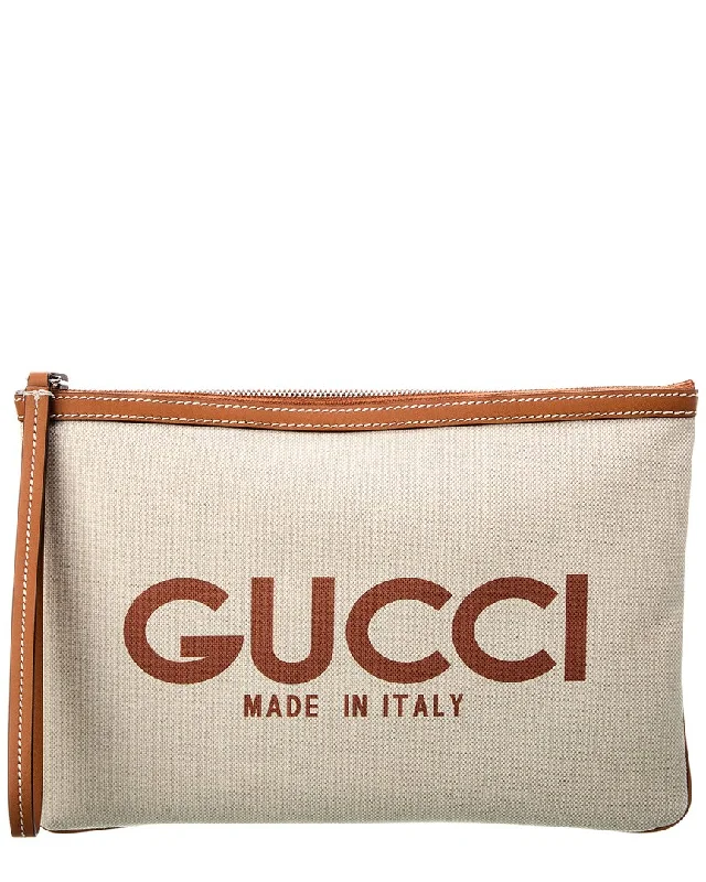 Monogrammed clutch as a personalized evening accessoryGucci Print Canvas & Leather Pouch