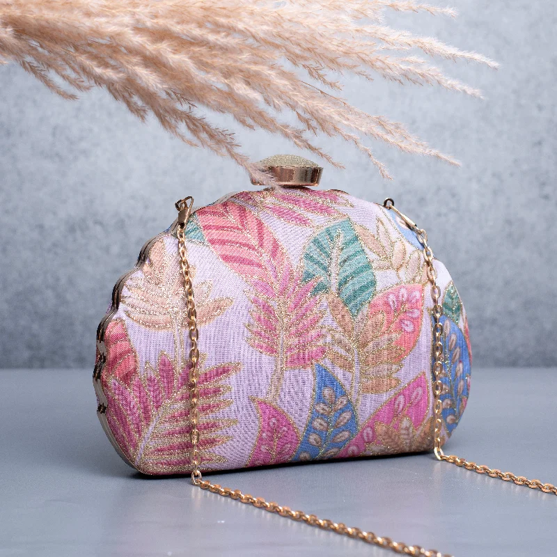 Velvet clutch with a tassel detail for a bohemian - chic styleArtklim Light Pink Based Pattern Printed Clutch