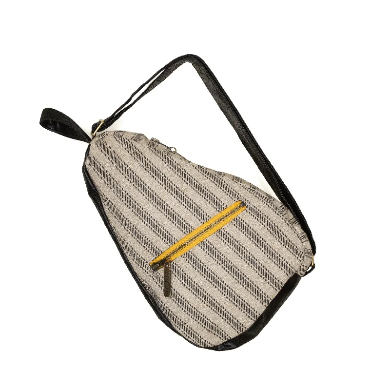 Crossbody bag with a magnetic snap closure for quick accessKatie: Ticking Stripe