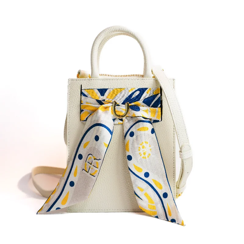 Silk - lined handle bag with a smooth interior to protect belongingsLeather Mini Calista + Maize Paisley Twilly