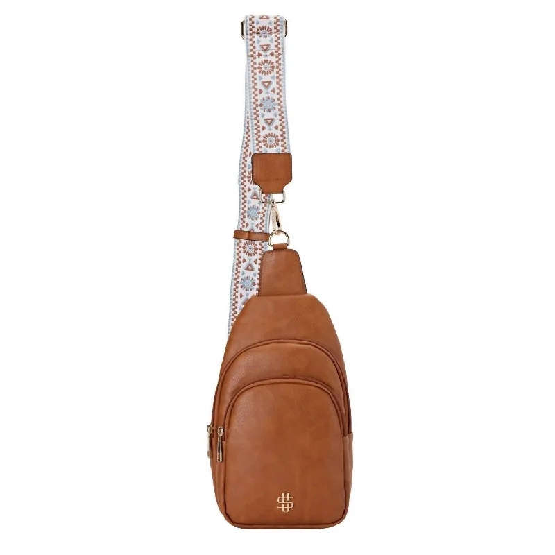 Silk crossbody bag with a delicate print for a feminine touchLeather Sling Bag In Fawn