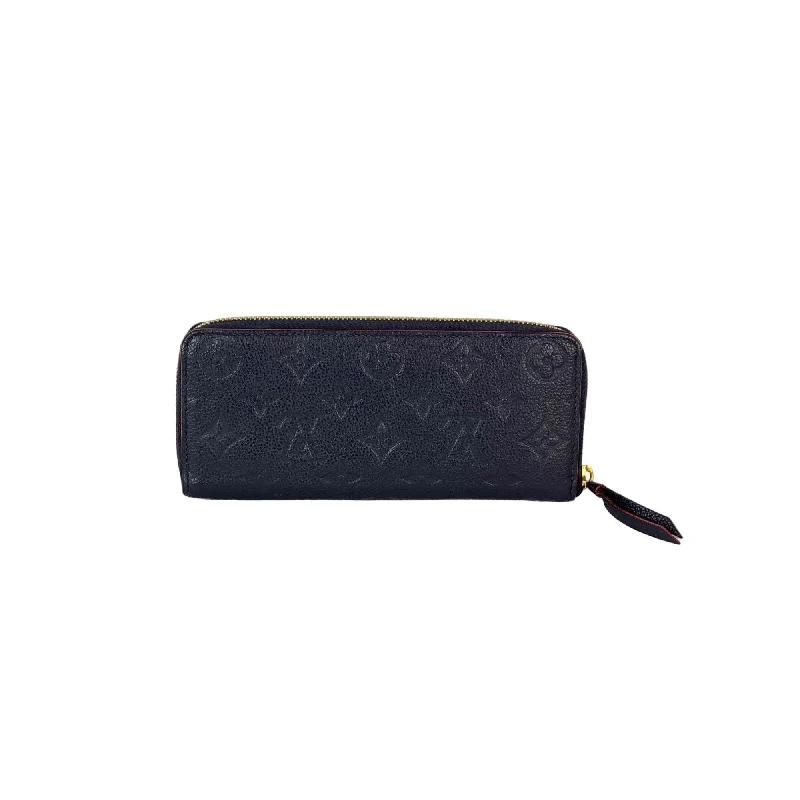 Embroidered silk clutch with a traditional motif for a cultural touchLOUIS VUITTON Clemence Empreinte Leather Blue Wallet Clutch