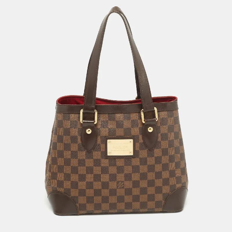 Color-blocked satchel with bold and bright colors for a trendy lookLouis Vuitton Damier Ebene Canvas Hampstead Pm Bag