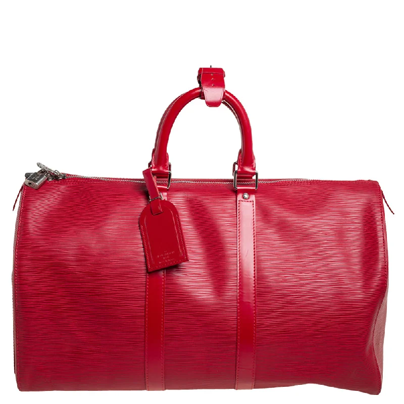 Faux fur satchel with a fluffy exterior for a winter fashion statementLouis Vuitton Red Epi Leather Keepall 45