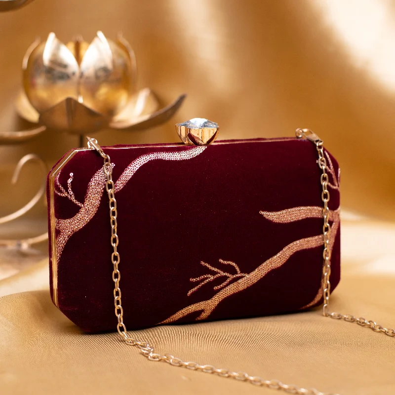 Mother - of - pearl clutch with a delicate sheenMaroon And Golden Embroidery Party Clutch