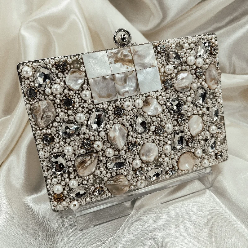 Lace - covered clutch for a romantic and feminine lookELORA Clutch