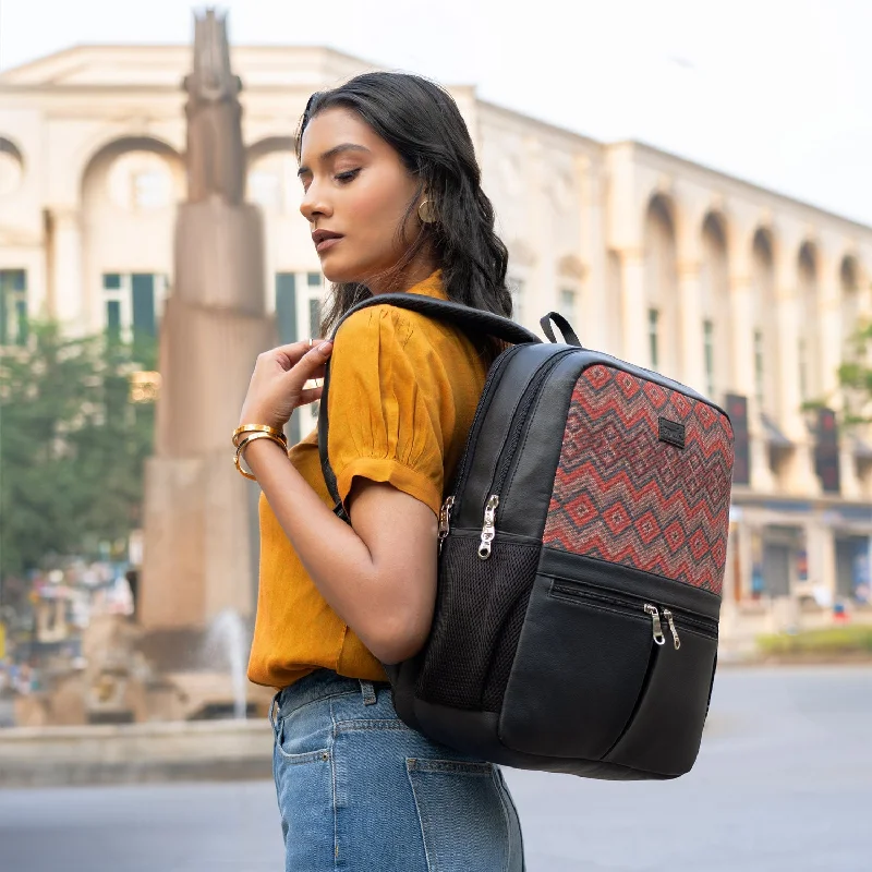 Leatherette backpack with a quilted texture and a magnetic snap closureGwalior Weaves Office Backpack