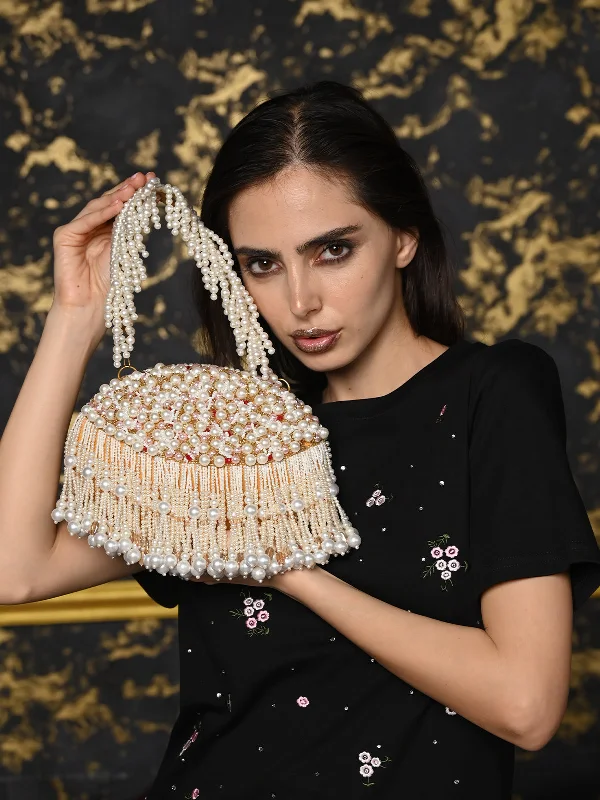 Miniature evening bag with a fold - over clasp for a compact optionOdette White Embroidered Clutch With Tassels For Women