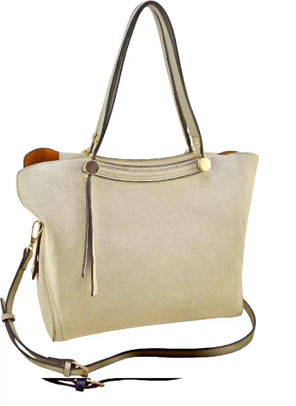 Canvas satchel with a colorful floral print for springtimePebbled Vegan Satchel In Beige